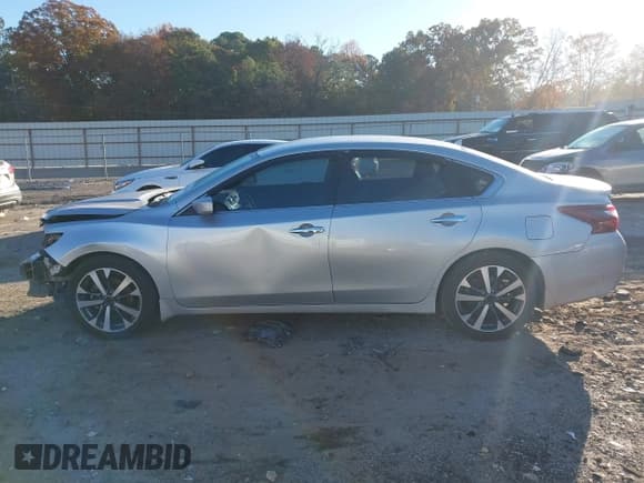 ✅ 2017 Nissan Altima SR • VIN: 1N4AL3AP1HC276194 • Lot: 43702089. Listed on IAAI with 212,712 mi. Free auction sales archive from the USA and detailed vehicle history report at DreamBid. Image 14.