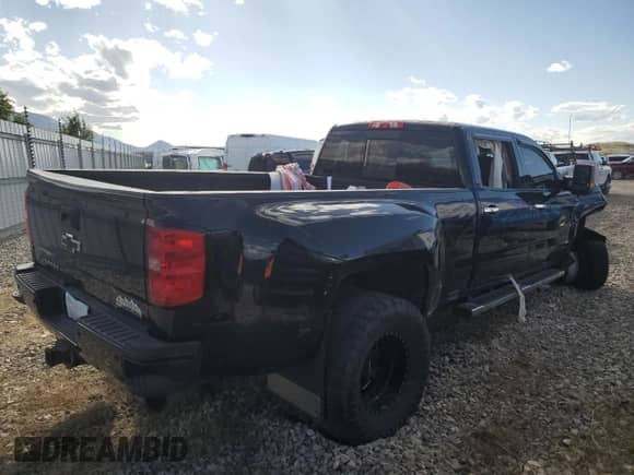 2016 Chevrolet Silverado 3500HD High Country с VIN 1GC4K1E82GF261248, выставлен на аукционе Copart как лот 57474855 с пробегом Не указан миль и Списание • Salvage title. История ставок и продаж доступна на DreamBid. Изображение 3.