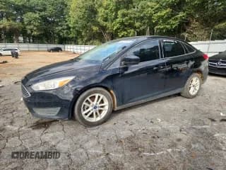 ✅ 2018 Ford Focus SE • VIN: 1FADP3F25JL279863 • Lot: 86262165. Listed on Copart with 209,077 mi. Free auction sales archive from the USA and detailed vehicle history report at DreamBid. Image 1.