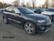 ✅ 2015 Jeep Grand Cherokee Overland • VIN: 1C4RJFCM7FC791589 • Lot: 77454564. Listed on Copart with 128,100 mi. Free auction sales archive from the USA and detailed vehicle history report at DreamBid. Image 4.