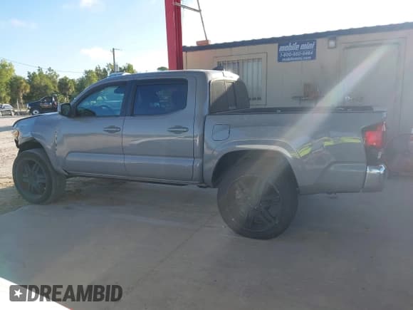 ✅ 2020 Toyota Tacoma SR5 • VIN: 5TFAX5GNXLX184051 • Lot: 43328803. Listed on IAAI with 76,825 mi. Free auction sales archive from the USA and detailed vehicle history report at DreamBid. Image 15.