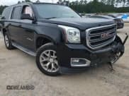 ✅ 2015 GMC Yukon XL SLT • VIN: 1GKS1HKC2FR155380 • Lot: 68177865. Listed on Copart with 252,694 mi. Free auction sales archive from the USA and detailed vehicle history report at DreamBid. Image 14.