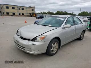 ✅ 2002 Toyota Camry LE • VIN: 4T1BE32K42U540937 • Lot: 82712705. Listed on Copart with 182,213 mi. Free auction sales archive from the USA and detailed vehicle history report at DreamBid. Image 1.
