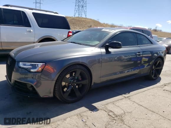 ✅ 2014 Audi RS 5 • VIN: WUAC6AFRXEA901484 • Lot: 50517445. Listed on Copart with 102,790 mi. Free auction sales archive from the USA and detailed vehicle history report at DreamBid. Image 1.