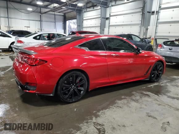 ✅ 2021 Infiniti Q60 Red Sport 400 • VIN: JN1FV7LL8MM560392 • Лот: 91982725. Опубликован ранее на Copart с пробегом 24 505 миль. Бесплатный доступ к архиву аукционных продаж из США и подробный отчёт об истории автомобиля на DreamBid. Изображение 3.