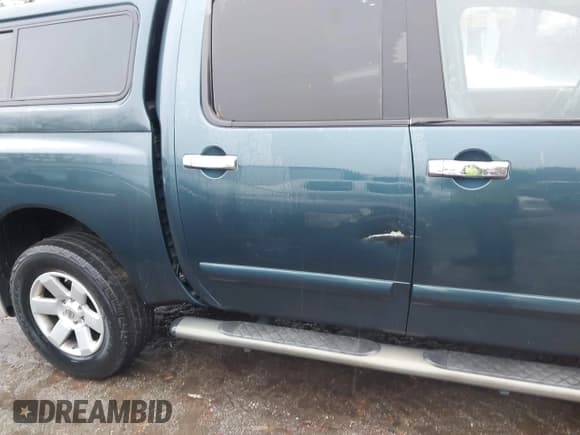 ✅ 2004 Nissan Titan SE • VIN: 1N6AA07B24N543462 • Lot: 43830874. Listed on IAAI with 196,490 mi. Free auction sales archive from the USA and detailed vehicle history report at DreamBid. Image 6.