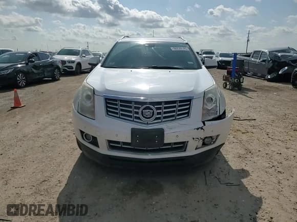 ✅ 2015 Cadillac SRX Performance Collection • VIN: 3GYFNCE39FS607266 • Lot: 90239145. Listed on Copart with 124,658 mi. Free auction sales archive from the USA and detailed vehicle history report at DreamBid. Image 13.
