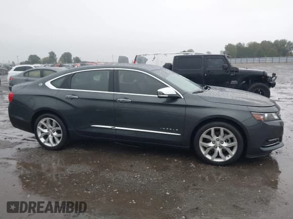 ✅ 2018 Chevrolet Impala Premier • VIN: 2G1125S33J9152101 • Lot: 43556287. Listed on IAAI with 105,495 mi. Free auction sales archive from the USA and detailed vehicle history report at DreamBid. Image 13.