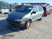 ✅ 2000 Toyota Sienna LE • VIN: 4T3ZF13C4YU296651 • Lot: 43770511. Listed on IAAI with 164,209 mi. Free auction sales archive from the USA and detailed vehicle history report at DreamBid. Image 2.