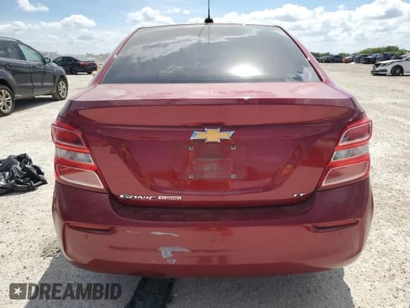 2018 Chevrolet Sonic LT с VIN 1G1JD5SB0J4135860, выставлен на аукционе Copart как лот 65930064 с пробегом 95 815 миль миль и Списание • Salvage title. История ставок и продаж доступна на DreamBid. Изображение 6.