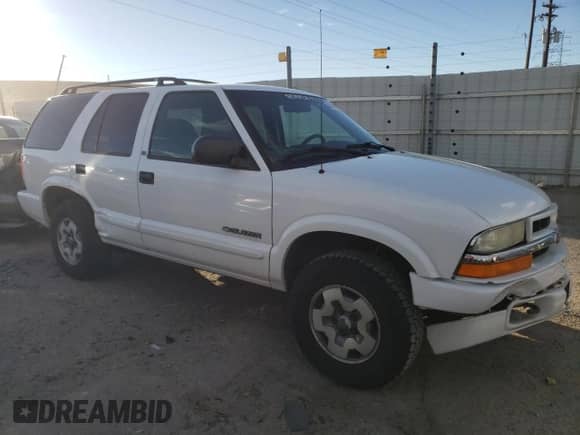 2003 Chevrolet Blazer LS z VIN 1GNDT13X33K136937, wystawiony jako Copart lot #80944284 z przebiegiem 163 549 mil mil oraz Szkoda całkowita • Salvage title. Historia ofert i sprzedaży dostępna na DreamBid. Obrazek 4.