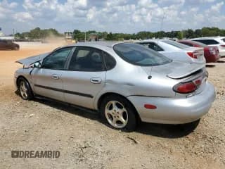 ✅ 1999 Ford Taurus SE • VIN: 1FAFP53S1XA324648 • Lot: 68235134. Listed on Copart with 184,439 mi. Free auction sales archive from the USA and detailed vehicle history report at DreamBid. Image 2.