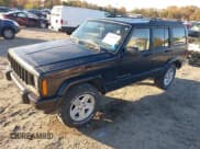✅ 2001 Jeep Cherokee Sport • VIN: 1J4FF58S61L530804 • Lot: 43519957. Listed on IAAI with 128,418 mi. Free auction sales archive from the USA and detailed vehicle history report at DreamBid. Image 2.