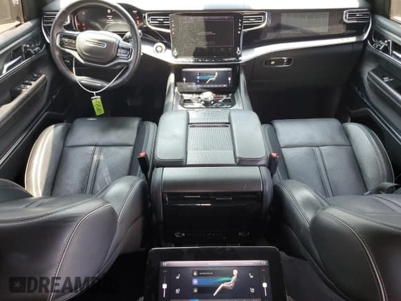 ✅ 2022 Jeep Grand Wagoneer Series II • VIN: 1C4SJVFP6NS195850 • Лот: 66600194. Опубликован ранее на Copart с пробегом 29 562 миль. Бесплатный доступ к архиву аукционных продаж из США и подробный отчёт об истории автомобиля на DreamBid. Изображение 8.