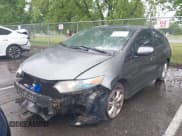 ✅ 2010 Honda Insight EX • VIN: JHMZE2H76AS010087 • Lot: 42324827. Listed on IAAI with 120,737 mi. Free auction sales archive from the USA and detailed vehicle history report at DreamBid. Image 6.