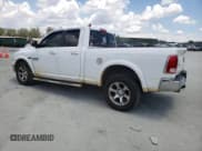 ✅ 2015 Ram 1500 Laramie • VIN: 1C6RR7JMXFS631477 • Lot: 66946105. Listed on Copart with 152,007 mi. Free auction sales archive from the USA and detailed vehicle history report at DreamBid. Image 2.