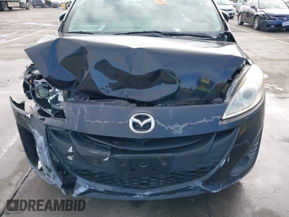 ✅ 2015 Mazda 5 Sport • VIN: JM1CW2BL1F0184498 • Лот: 39903933. Опубликован ранее на IAAI с пробегом 90 905 миль. Бесплатный доступ к архиву аукционных продаж из США и подробный отчёт об истории автомобиля на DreamBid. Изображение 6.