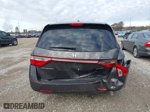 ✅ 2012 Honda Odyssey Touring • VIN: 5FNRL5H92CB083290 • Lot: 43664749. Listed on IAAI with 315,361 mi. Free auction sales archive from the USA and detailed vehicle history report at DreamBid. Image 16.
