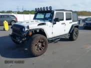 ✅ 2014 Jeep Wrangler Unlimited Sport • VIN: 1C4BJWDG1EL154948 • Лот: 43674003. Опубликован ранее на IAAI с пробегом 101 988 миль. Бесплатный доступ к архиву аукционных продаж из США и подробный отчёт об истории автомобиля на DreamBid. Изображение 17.