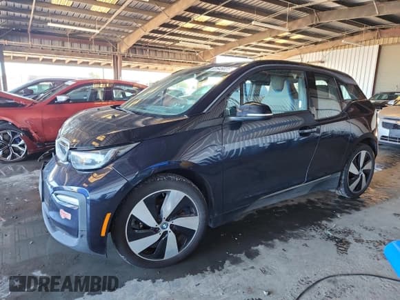 ✅ 2018 BMW i3 • VIN: WBY7Z2C58JVE61833 • Lot: 82645025. Listed on Copart with 87,598 mi. Free auction sales archive from the USA and detailed vehicle history report at DreamBid. Image 1.