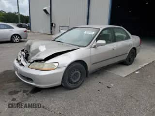 1999 Honda Accord LX z VIN 1HGCG5641XA055921, wystawiony jako Copart lot #70270405 z przebiegiem 148 202 mil mil oraz Szkoda całkowita • Salvage title. Historia ofert i sprzedaży dostępna na DreamBid. Obrazek 1.