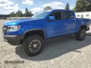✅ 2020 Chevrolet Colorado 4WD ZR2 • VIN: 1GCPTEE19L1176032 • Lot: 56003155. Listed on Copart with 44,548 mi. Free auction sales archive from the USA and detailed vehicle history report at DreamBid. Image 1.