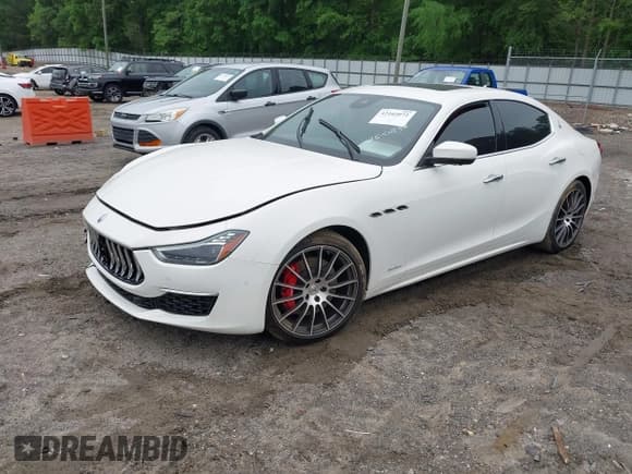 ✅ 2021 Maserati Ghibli S GranLusso • VIN: ZAM57YSL3M1362066 • Лот: 42102072. Опубликован ранее на IAAI с пробегом 55 418 миль. Бесплатный доступ к архиву аукционных продаж из США и подробный отчёт об истории автомобиля на DreamBid. Изображение 2.