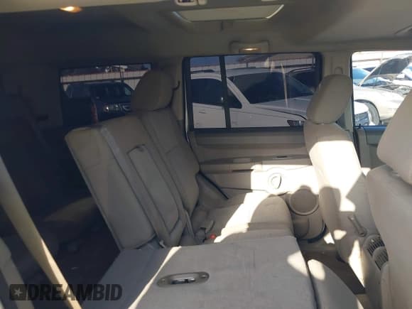 ✅ 2007 Jeep Commander Sport • VIN: 1J8HH48K47C699904 • Lot: 42509665. Listed on IAAI with 198,539 mi. Free auction sales archive from the USA and detailed vehicle history report at DreamBid. Image 8.
