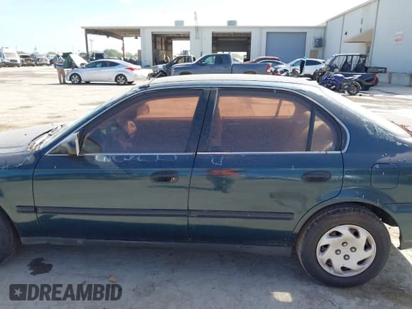 ✅ 1996 Honda Civic LX O • VIN: 2HGEJ667XTH545957 • Лот: 42866308. Опубликован ранее на IAAI с пробегом 217 969 миль. Бесплатный доступ к архиву аукционных продаж из США и подробный отчёт об истории автомобиля на DreamBid. Изображение 14.