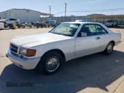 ✅ 1990 Mercedes-Benz 560 • VIN: WDBCA45E8LA528890 • Lot: 46874855. Listed on Copart with 171,512 mi. Free auction sales archive from the USA and detailed vehicle history report at DreamBid. Image 1.