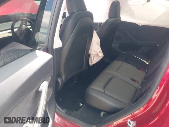 ✅ 2024 Tesla Model Y • VIN: 7SAYGDED7RF045410 • Лот: 42000700. Опубликован ранее на IAAI с пробегом 13 021 миль. Бесплатный доступ к архиву аукционных продаж из США и подробный отчёт об истории автомобиля на DreamBid. Изображение 8.