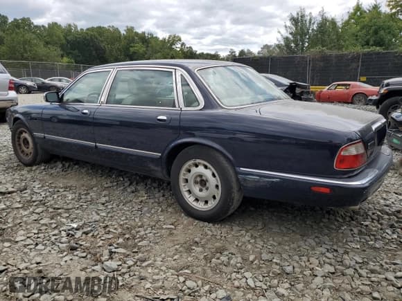 ✅ 2000 Jaguar XJ Vanden Plas • VIN: SAJDA24CXYLF13463 • Lot: 67797454. Listed on Copart with 144,765 mi. Free auction sales archive from the USA and detailed vehicle history report at DreamBid. Image 2.