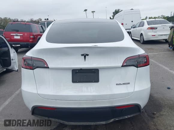 ✅ 2023 Tesla Model Y Long Range • VIN: 7SAYGDEE3PA055497 • Lot: 42396529. Listed on IAAI with 18,230 mi. Free auction sales archive from the USA and detailed vehicle history report at DreamBid. Image 15.