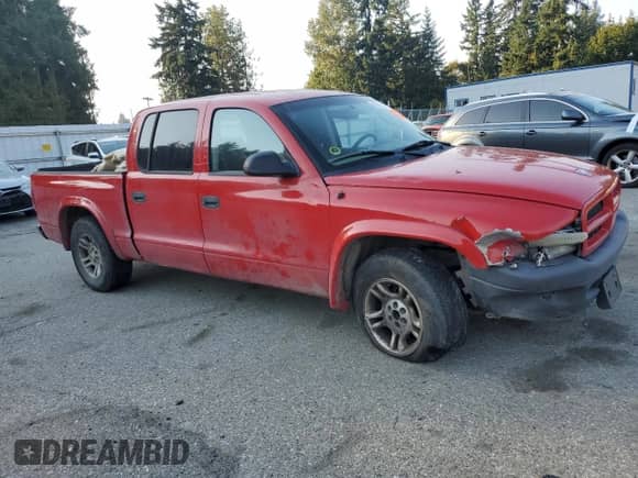 2003 Dodge Dakota Sport with VIN 1D7HL38XX3S275337, listed as a Copart auction lot 80963815 with 274,880 mi miles and Salvage title. Bid and sale history available at DreamBid. Image 4.