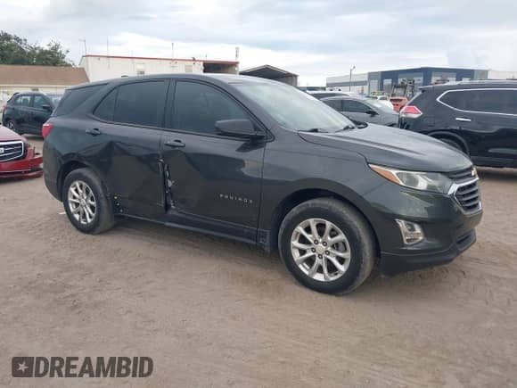 ✅ 2018 Chevrolet Equinox LS • VIN: 2GNAXHEV8J6105629 • Lot: 43307488. Listed on IAAI with 159,507 mi. Free auction sales archive from the USA and detailed vehicle history report at DreamBid. Image 1.