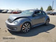 ✅ 2012 Volkswagen Beetle Turbo • VIN: 3VWVA7AT4CM640974 • Lot: 68192215. Listed on Copart with 60,438 mi. Free auction sales archive from the USA and detailed vehicle history report at DreamBid. Image 1.