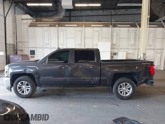 2016 Chevrolet Silverado 1500 LT with VIN 3GCUKREC6GG129840, listed as a IAAI auction lot 43088052 with 123,184 mi miles and . Bid and sale history available at DreamBid. Image 15.