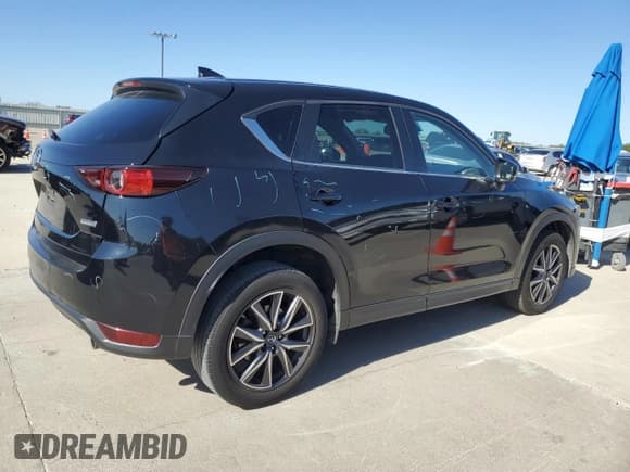 ✅ 2018 Mazda CX-5 Touring • VIN: JM3KFACM0J0310119 • Lot: 87260445. Wystawiony na Copart z przebiegiem 137 160 mil. Bezpłatny archiwum sprzedaży aukcyjnych z USA i szczegółowy raport historii pojazdu na DreamBid. Zdjęcie 3.