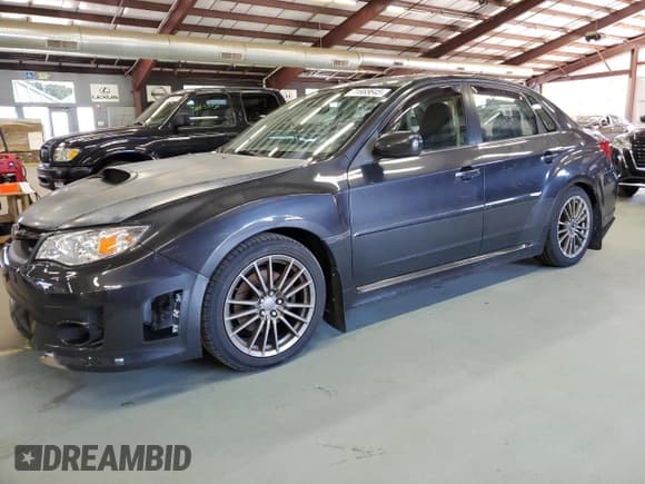 ✅ 2012 Subaru WRX WRX Premium • VIN: JF1GV7F65CG028673 • Lot: 71665645. Listed on Copart with 125,564 mi. Free auction sales archive from the USA and detailed vehicle history report at DreamBid. Image 1.