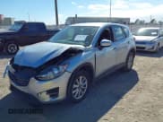 ✅ 2016 Mazda CX-5 Sport • VIN: JM3KE2BE9G0915168 • Lot: 41482749. Wystawiony na IAAI z przebiegiem 86 802 mil. Bezpłatny archiwum sprzedaży aukcyjnych z USA i szczegółowy raport historii pojazdu na DreamBid. Zdjęcie 2.