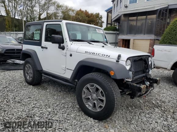 ✅ 2015 Jeep Wrangler Rubicon Hard Rock • VIN: 1C4BJWCG8FL713138 • Лот: 89868115. Опубликован ранее на Copart с пробегом 83 894 миль. Бесплатный доступ к архиву аукционных продаж из США и подробный отчёт об истории автомобиля на DreamBid. Изображение 4.