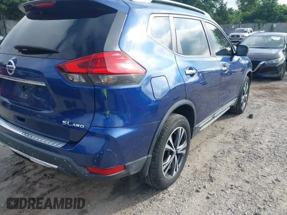 ✅ 2017 Nissan Rogue SL • VIN: 5N1AT2MVXHC780740 • Lot: 42734053. Listed on IAAI with 165,596 mi. Free auction sales archive from the USA and detailed vehicle history report at DreamBid. Image 4.