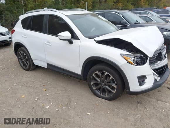 ✅ 2016 Mazda CX-5 Grand Touring • VIN: JM3KE4DY6G0873688 • Lot: 43565324. Wystawiony na IAAI z przebiegiem 80 920 mil. Bezpłatny archiwum sprzedaży aukcyjnych z USA i szczegółowy raport historii pojazdu na DreamBid. Zdjęcie 1.