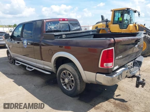 ✅ 2015 Ram 2500 Laramie • VIN: 3C6UR5NL0FG557882 • Лот: 42932287. Опубликован ранее на IAAI с пробегом 359 946 миль. Бесплатный доступ к архиву аукционных продаж из США и подробный отчёт об истории автомобиля на DreamBid. Изображение 3.