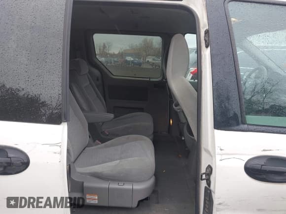 ✅ 2005 Ford Freestar SE • VIN: 2FMZA51635BA26999 • Лот: 43516000. Опубликован ранее на IAAI с пробегом 91 660 миль. Бесплатный доступ к архиву аукционных продаж из США и подробный отчёт об истории автомобиля на DreamBid. Изображение 8.