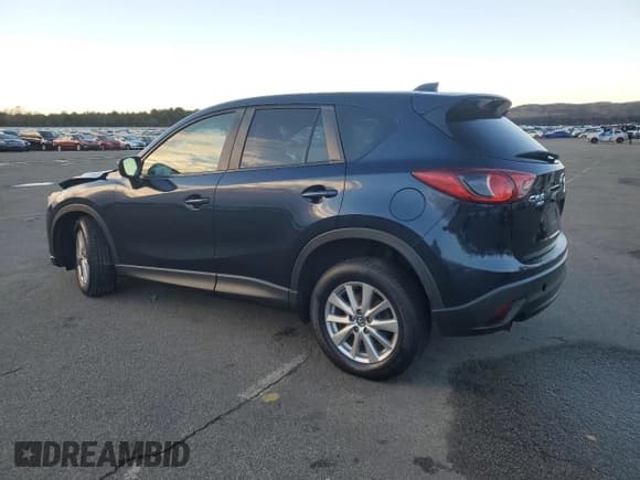 ✅ 2015 Mazda CX-5 Touring • VIN: JM3KE4CY3F0529851 • Lot: 93487675. Listed on Copart with 160,504 mi. Free auction sales archive from the USA and detailed vehicle history report at DreamBid. Image 2.
