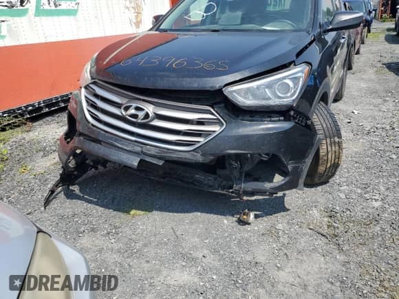 2018 Hyundai Santa Fe 2.4L z VIN 5XYZU3LB3JG546295, wystawiony jako Copart lot #64396365 z przebiegiem 112 822 mil mil oraz Szkoda całkowita • Salvage title. Historia ofert i sprzedaży dostępna na DreamBid. Obrazek 13.