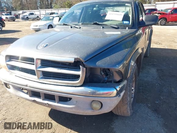 ✅ 2003 Dodge Dakota SLT • VIN: 1D7HL48X03S174569 • Lot: 41159169. Wystawiony na IAAI z przebiegiem 156 551 mil. Bezpłatny archiwum sprzedaży aukcyjnych z USA i szczegółowy raport historii pojazdu na DreamBid. Zdjęcie 6.