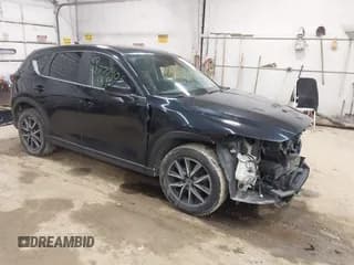 ✅ 2018 Mazda CX-5 Touring • VIN: JM3KFBCM2J0380100 • Lot: 43777906. Listed on IAAI with 108,960 mi. Free auction sales archive from the USA and detailed vehicle history report at DreamBid. Image 1.