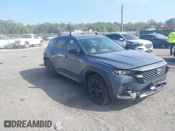 ✅ 2024 Mazda CX-50 S Preferred • VIN: 7MMVABBM1RN213702 • Lot: 43359850. Listed on IAAI with 34,042 mi. Free auction sales archive from the USA and detailed vehicle history report at DreamBid. Image 1.